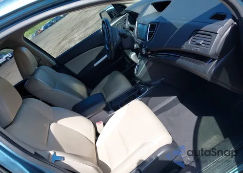 2016 Honda Cr-V Touring z USA, uszkodzony, nr VIN 5J6RM3H9XGL016595